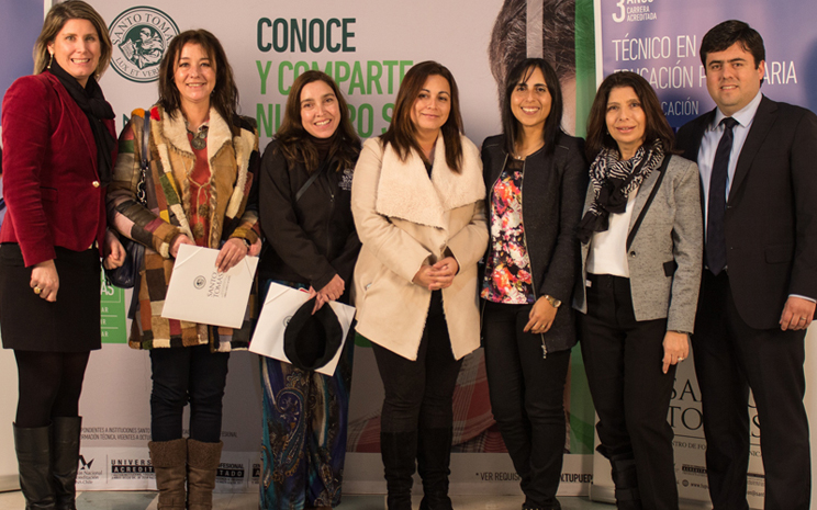 Sandra Torresi y académicos Santo Tomás