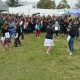 cientos de jóvenes bailan durante las fondas tomasinas de Santo Tomás Puente Alto.